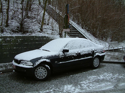 BMW 320d covered in snow