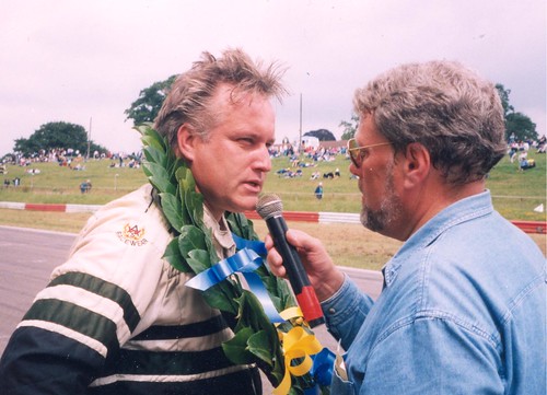Julian Birley talks to Andrew Wilkins after a race win in his 75 3 litre at Mallory Park in 2001. It was through Julian’s generous Powermods  sponsorship that ARCA was able to prosper.