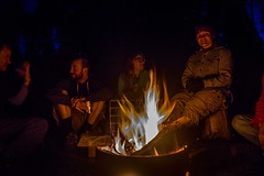 Story-telling and laughter around the fire in Lake Louise, Canada.