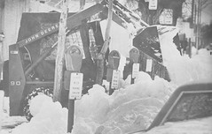 A front end loader is used to clear the heavy snow in Denver. (Rocky Mountain News / Denver Public Library Archives)