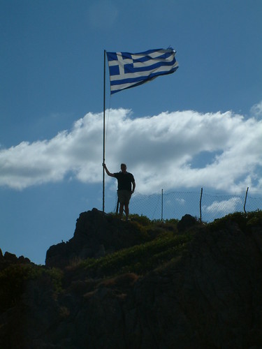 Frederik holds the Greek flag