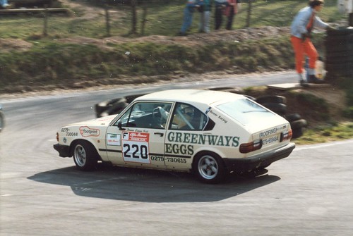 Class F champion Simon Fish in 1990 rounds the bumpy Cadwell hairpin on the short circuit with his Alfasud Ti. He now races an Ensign Historic F1 car.