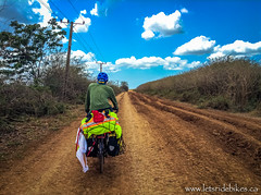 Riding on a crappy dirt road, in Cuba.