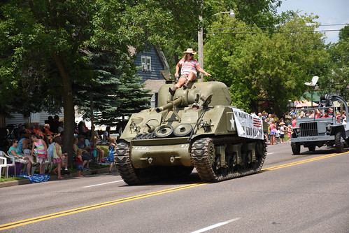 Only your finer home town parades have a working World War II tank.   Kai figures it is an M4 Sherman. • <a style="font-size:0.8em;" href="http://www.flickr.com/photos/96277117@N00/19623317902/" target="_blank">View on Flickr</a>