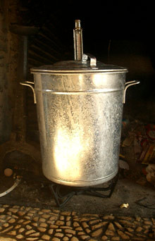 A brand new sterilizing bucket on the gas ring