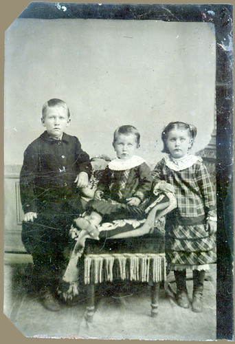 Tintype: A boy, a girl and then another girl.