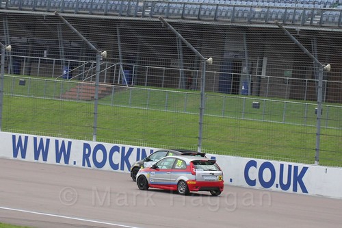 Nathan Edwards and Carlito Miracco in Race 2 at the BRSCC Fiesta Junior Championship, Rockingham, Sept 2015