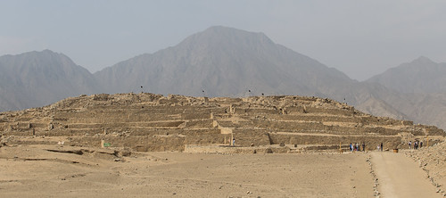 Caral massive pyramid below mountains, Peru