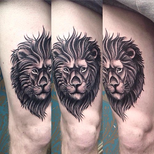 Neo Traditional black Lion Tattoo On Bicep