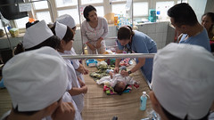 Pediatrician Erin Novak and Con Nguyen, along with local health care staff, in Vietnam • <a style="font-size:0.8em;" href="http://www.flickr.com/photos/109076046@N08/22548785246/" target="_blank">View on Flickr</a>