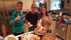 Kyle & Jennie can hardly wait for Daryl to get the turkey carved!