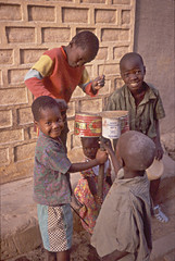 Young musicians and makeshift drum set in Mali