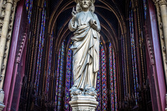 The stained glass windows at Sainte-Chapelle in Paris were incredible!  Guess I couldn't get this guys head in the picture; oops.