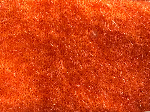Orange scrub brush