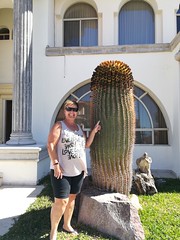 Angela posing with a cactus